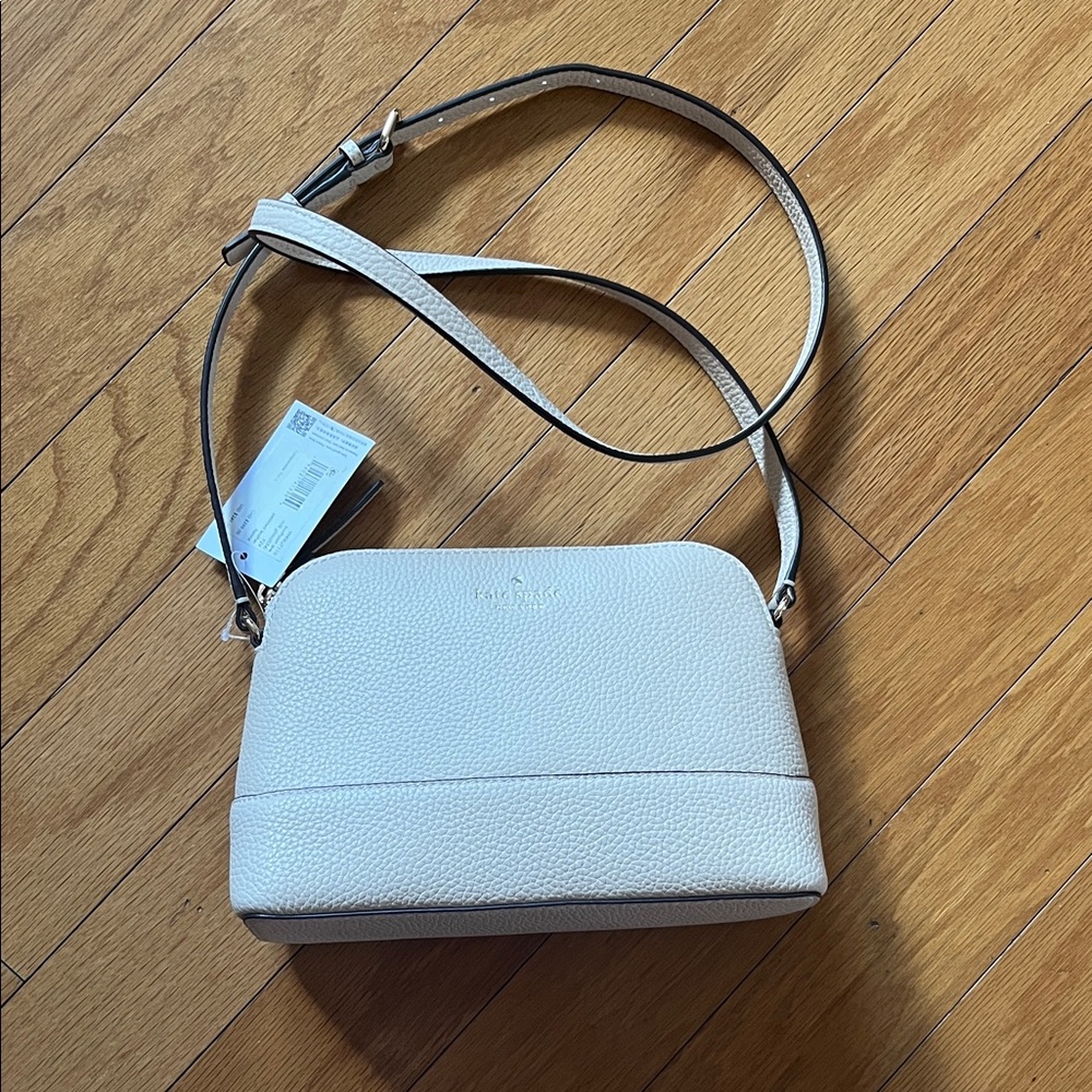 kate spade Pebbled Leather Crossbody Bag in Light Cream
